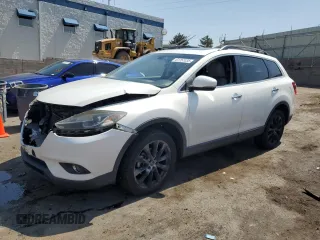 2015 Mazda CX-9 Grand Touring с VIN JM3TB3DA7F0454094, выставлен на аукционе Copart как лот 61757035 с пробегом 56 997 миль миль и Списание • Salvage title. История ставок и продаж доступна на DreamBid. Изображение 1.