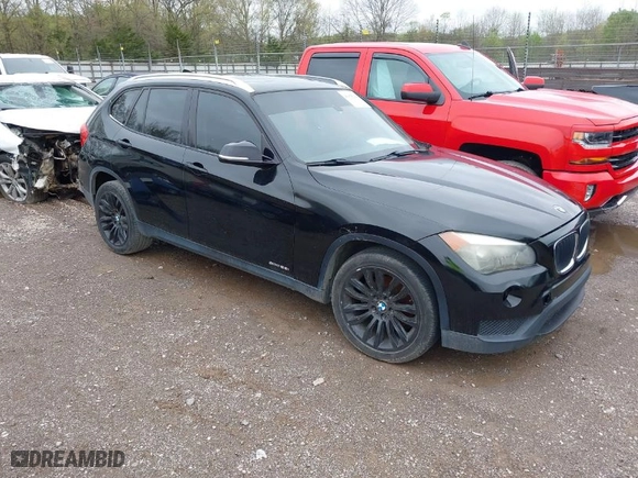 2013 BMW X1 28i with VIN WBAVM1C5XDVW46529, listed as a IAAI auction lot 41975148 with 156,968 mi miles. Bid and sale history available at carsss.com. Image 1.