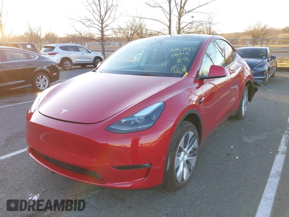 2023 Tesla Model Y Long Range with VIN 7SAYGDEE1PF860207, listed as a IAAI auction lot 41101287 with 24,320 mi miles. Bid and sale history available at carsss.com. Image 17.