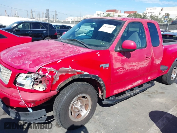 2001 Ford F-150 XL with VIN 2FTRX07L51CA22573, listed as a IAAI auction lot 41710008 with 1 mi miles. Bid and sale history available at carsss.com. Image 6.