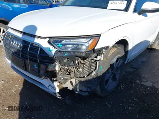 2022 Audi Q5 Premium Plus z VIN WA1BBAFY0N2078094, wystawiony jako IAAI lot #42061485 z przebiegiem 23 152 mil mil oraz . Historia ofert i sprzedaży dostępna na DreamBid. Obrazek 6.