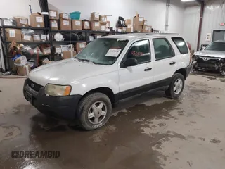 2004 Ford Escape XLS with VIN 1FMYU921X4KA88997, listed as a IAAI auction lot 41520334 with 211,761 mi miles and . Bid and sale history available at DreamBid. Image 2.