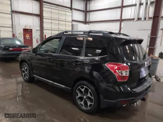 2015 Subaru Forester 2.0XT Touring with VIN JF2SJGUC9FH548304, listed as a IAAI auction lot 41728543 with 114,450 mi miles. Bid and sale history available at carsss.com. Image 3.