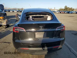 2022 Tesla Model Y Long Range with VIN 7SAYGAEE1NF562042, listed as a Copart auction lot 45702845 with 34,240 mi miles and Salvage Title. Bid and sale history available at carsss.com. Image 6.