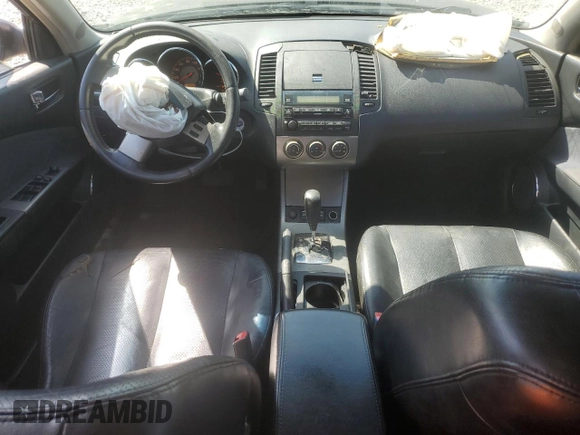 2005 Nissan Altima SE z VIN 1N4BL11D85C209229, wystawiony jako Copart lot #52391285 z przebiegiem 164 231 mil mil oraz Szkoda całkowita • Salvage title. Historia ofert i sprzedaży dostępna na DreamBid. Obrazek 8.
