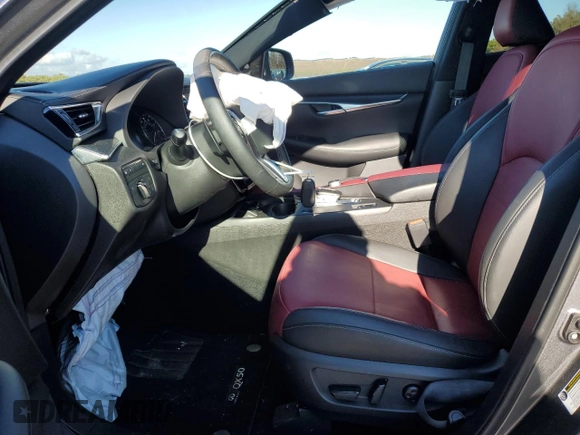 2023 Infiniti QX50 Sport with VIN 3PCAJ5FB6PF113227, listed as a Copart auction lot 84563144 with 7,465 mi miles and Salvage Title. Bid and sale history available at DreamBid. Image 7.