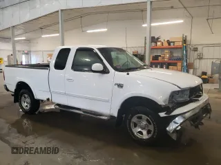 1999 Ford F-150 XL with VIN 2FTRX18L1XCA22096, listed as a Copart auction lot 52402885 with 120,254 mi miles and Salvage Title. Bid and sale history available at carsss.com. Image 4.