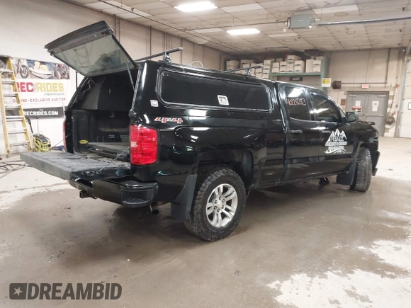 2017 Chevrolet Silverado 1500 Custom with VIN 1GCVKPEC2HZ331214, listed as a IAAI auction lot 40228283 with 132,407 mi miles. Bid and sale history available at carsss.com. Image 4.