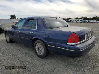 2004 Ford Police Interceptor Base w/3.27 Axle with VIN 2FAFP71W54X185452, listed as a Copart auction lot 57003145 with 159,532 mi miles and Clean title. Bid and sale history available at DreamBid. Image 2.