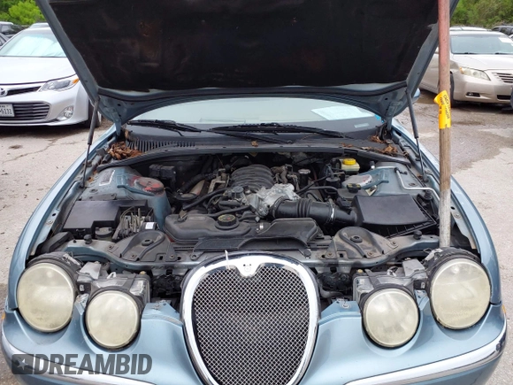 2003 Jaguar S-Type with VIN SAJEA01U33HM70079, listed as a IAAI auction lot 41939388 with 147,975 mi miles and . Bid and sale history available at DreamBid. Image 10.