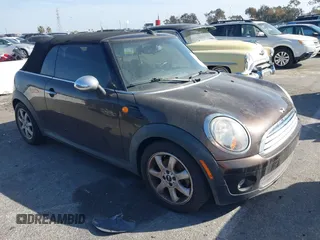 2010 MINI Convertible with VIN WMWMR3C50ATU97550, listed as a IAAI auction lot 41709012 with 86,499 mi miles and . Bid and sale history available at DreamBid. Image 1.