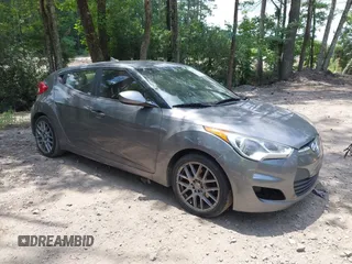 2012 Hyundai Veloster w/Black Int with VIN KMHTC6AD3CU078547, listed as a IAAI auction lot 42633915 with 143,633 mi miles and . Bid and sale history available at DreamBid. Image 1.