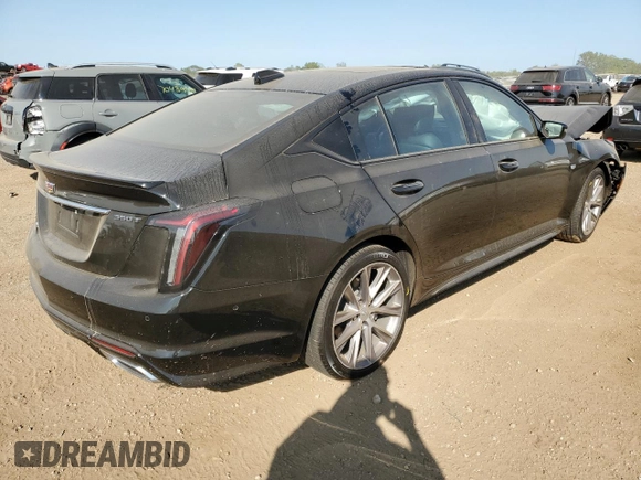 2023 Cadillac CT5 Sport z VIN 1G6DU5RK9P0135448, wystawiony jako Copart lot #70596274 z przebiegiem 9 159 mil mil oraz Szkoda całkowita • Salvage title. Historia ofert i sprzedaży dostępna na DreamBid. Obrazek 3.