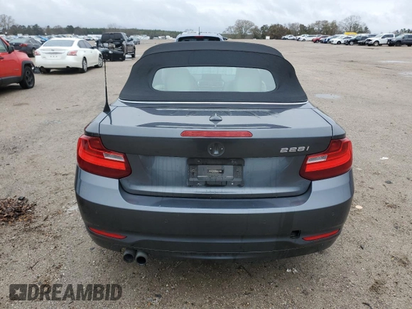 2015 BMW 2 Series 228i with VIN WBA1K5C57FV474037, listed as a Copart auction lot 87857635 with 91,333 mi miles and Salvage title. Bid and sale history available at DreamBid. Image 6.