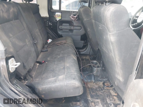 2008 Jeep Wrangler Unlimited Sahara with VIN 1J4GB591X8L523581, listed as a IAAI auction lot 42035446 with 200,570 mi miles and . Bid and sale history available at DreamBid. Image 8.