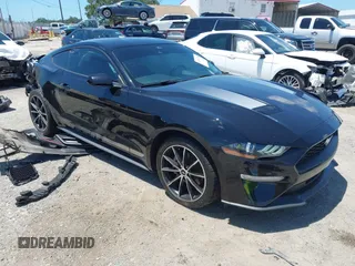 2021 Ford Mustang EcoBoost z VIN 1FA6P8TH1M5137372, wystawiony jako IAAI lot #42031716 z przebiegiem 58 475 mil mil oraz . Historia ofert i sprzedaży dostępna na DreamBid. Obrazek 1.