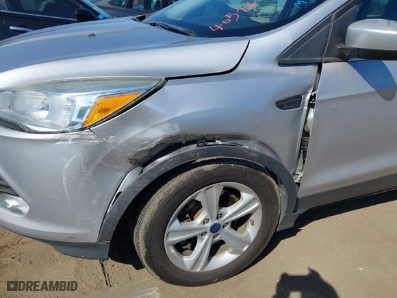 2015 Ford Escape SE with VIN 1FMCU9G99FUA44456, listed as a IAAI auction lot 40526412 with 94,998 mi miles. Bid and sale history available at carsss.com. Image 6.