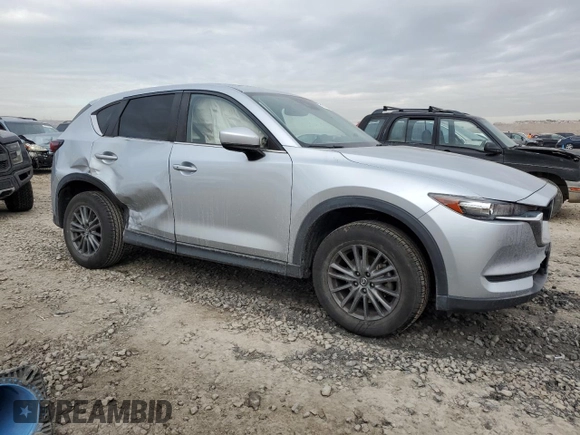 2021 Mazda CX-5 Touring with VIN JM3KFACM9M0409414, listed as a Copart auction lot 89071495 with 43,896 mi miles and Salvage Title. Bid and sale history available at carsss.com. Image 4.