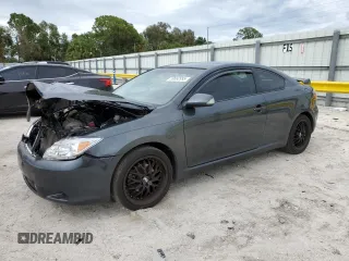 2010 Scion tC z VIN JTKDE3B77A0318139, wystawiony jako Copart lot #59660995 z przebiegiem 191 769 mil mil oraz Szkoda całkowita • Salvage title. Historia ofert i sprzedaży dostępna na DreamBid. Obrazek 1.