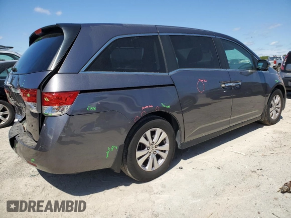 2016 Honda Odyssey EX-L with VIN 5FNRL5H6XGB100929, listed as a Copart auction lot 48889205 with 148,766 mi miles and Salvage Title. Bid and sale history available at DreamBid. Image 3.