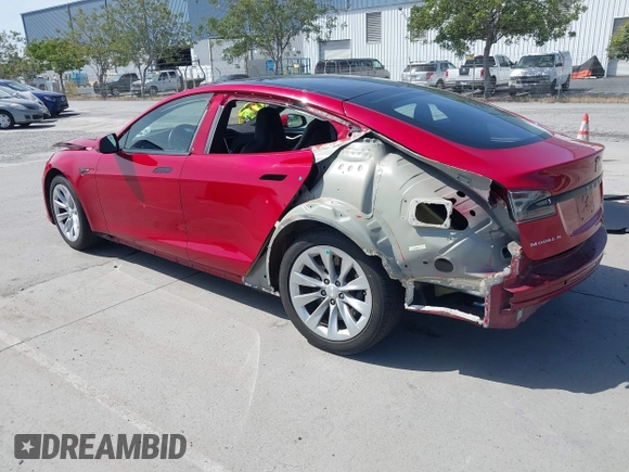 2016 Tesla Model S 70 with VIN 5YJSA1E17GF152401, listed as a IAAI auction lot 42272384 with 65,698 mi miles and . Bid and sale history available at DreamBid. Image 3.