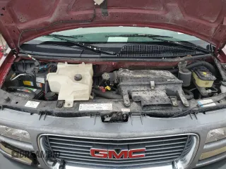 1999 GMC Savana z VIN 1GDFG15R3X1157847, wystawiony jako Copart lot #79041264 z przebiegiem 208 719 mil mil oraz Szkoda całkowita • Salvage title. Historia ofert i sprzedaży dostępna na DreamBid. Obrazek 12.
