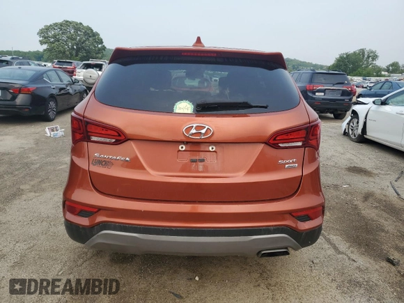 2017 Hyundai Santa Fe 2.4L z VIN 5XYZTDLB8HG442999, wystawiony jako Copart lot #58805795 z przebiegiem 166 204 mil mil oraz Nie do naprawy • Non repairable. Historia ofert i sprzedaży dostępna na DreamBid. Obrazek 6.
