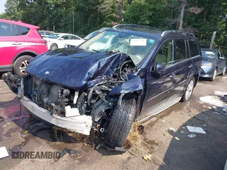 2011 Mercedes-Benz GL-Class GL 450 with VIN 4JGBF7BE8BA627367, listed as a IAAI auction lot 39992230 with 153,606 mi miles. Bid and sale history available at carsss.com. Image 17.