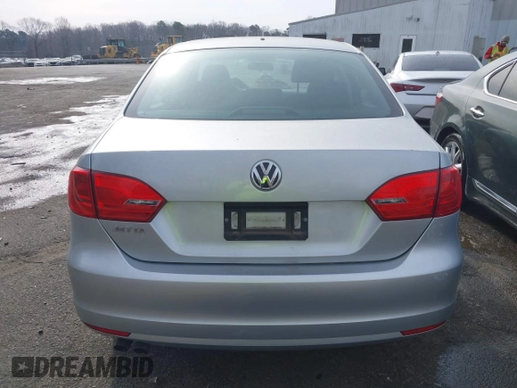 2014 Volkswagen Jetta S with VIN 3VW2K7AJ7EM313535, listed as a IAAI auction lot 41786112 with 63,694 mi miles and . Bid and sale history available at DreamBid. Image 16.