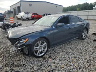 2014 Audi A6 Prestige with VIN WAUHGBFC0EN124935, listed as a Copart auction lot 62097015 with Not provided miles and Clean title. Bid and sale history available at DreamBid. Image 1.