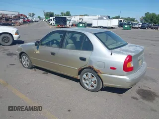 2002 Hyundai Accent GL z VIN KMHCG45C62U336245, wystawiony jako IAAI lot #42312838 z przebiegiem 310 753 mil mil oraz . Historia ofert i sprzedaży dostępna na DreamBid. Obrazek 3.