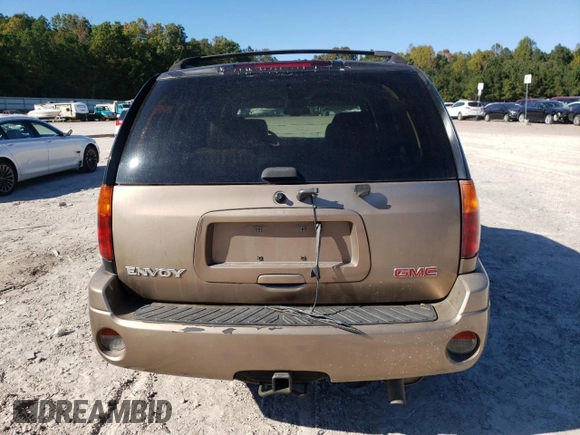 2002 GMC Envoy SLT with VIN 1GKDT13S022456264, listed as a Copart auction lot 76556004 with 230,954 mi miles and Salvage Title. Bid and sale history available at DreamBid. Image 6.