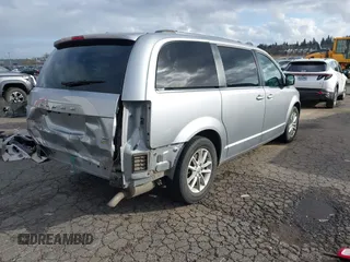 2019 Dodge Grand Caravan SXT with VIN 2C4RDGCG0KR786940, listed as a IAAI auction lot 41648332 with 96,427 mi miles and . Bid and sale history available at DreamBid. Image 4.