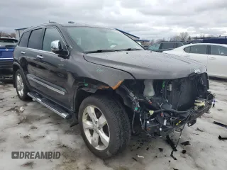 2013 Jeep Grand Cherokee Overland with VIN 1C4RJFCG7DC571280, listed as a Copart auction lot 47250365 with 53,907 mi miles and Salvage Title. Bid and sale history available at carsss.com. Image 4.