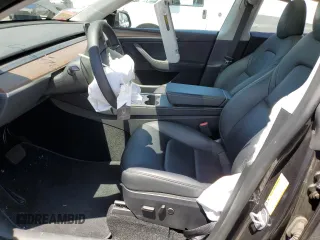 2024 Tesla Model Y с VIN 7SAYGDED5RF177307, выставлен на аукционе Copart как лот 57170315 с пробегом 14 726 миль миль и Списание • Salvage title. История ставок и продаж доступна на DreamBid. Изображение 7.