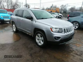 2016 Jeep Compass Sport with VIN 1C4NJDBB0GD520971, listed as a IAAI auction lot 41931731 with 124,038 mi miles and . Bid and sale history available at carsss.com. Image 1.