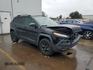 2017 Jeep Cherokee Trailhawk L Plus with VIN 1C4PJMBS2HW621430, listed as a Copart auction lot 84537184 with 125,101 mi miles and Salvage Title. Bid and sale history available at carsss.com. Image 4.