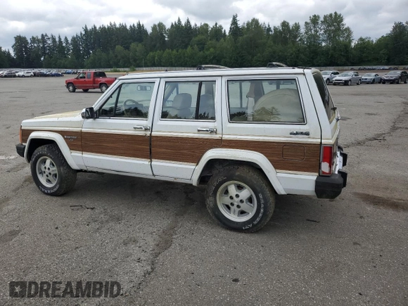 1990 Jeep Grand Wagoneer z VIN 1J4FN78L0LL282169, wystawiony jako Copart lot #59809545 z przebiegiem 194 382 mil mil oraz Czysty tytuł • Clean title. Historia ofert i sprzedaży dostępna na DreamBid. Obrazek 2.