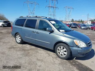 2007 Hyundai Entourage GLS with VIN KNDMC233276029825, listed as a IAAI auction lot 41887439 with 143,544 mi miles. Bid and sale history available at carsss.com. Image 1.