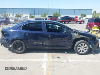 2020 Toyota Corolla LE with VIN 5YFEPRAE5LP145142, listed as a IAAI auction lot 42153289 with 35,010 mi miles and . Bid and sale history available at DreamBid. Image 14.