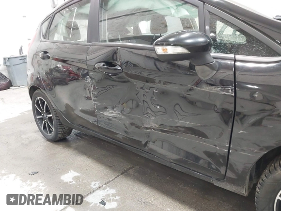 2018 Ford Fiesta SE with VIN 3FADP4EJ4JM139543, listed as a IAAI auction lot 41652653 with 47,517 mi miles and . Bid and sale history available at DreamBid. Image 6.