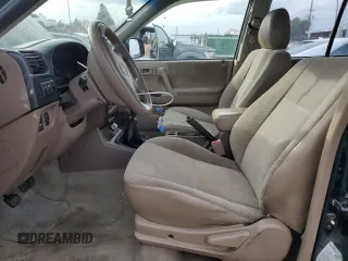 2000 Honda Passport LX с VIN 4S6DM58W0Y4406220, выставлен на аукционе Copart как лот 82774694 с пробегом 171 487 миль миль и Списание • Salvage title. История ставок и продаж доступна на DreamBid. Изображение 7.