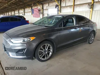 2020 Ford Fusion SEL z VIN 3FA6P0CD3LR131180, wystawiony jako Copart lot #63843355 z przebiegiem 146 705 mil mil oraz Czysty tytuł • Clean title. Historia ofert i sprzedaży dostępna na DreamBid. Obrazek 1.