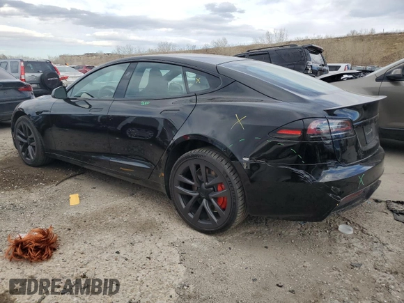 2024 Tesla Model S Plaid z VIN 5YJSA1E65RF543822, wystawiony jako Copart lot #48545205 z przebiegiem 2 473 mil mil oraz Szkoda całkowita • Salvage title. Historia ofert i sprzedaży dostępna na DreamBid. Obrazek 2.