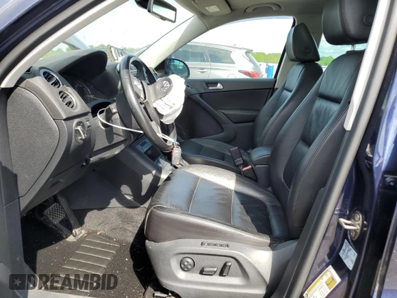 2016 Volkswagen Tiguan SEL with VIN WVGAV7AXXGW555809, listed as a Copart auction lot 55177805 with 40,676 mi miles and Salvage Title. Bid and sale history available at DreamBid. Image 7.