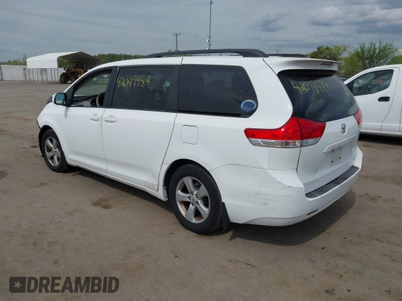 2011 Toyota Sienna LE AAS with VIN 5TDKK3DC0BS028826, listed as a IAAI auction lot 42099484 with 143,745 mi miles and . Bid and sale history available at DreamBid. Image 3.