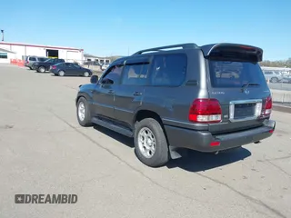 2003 Lexus LX with VIN JTJHT00W033531066, listed as a IAAI auction lot 41969617 with 209,710 mi miles. Bid and sale history available at carsss.com. Image 3.