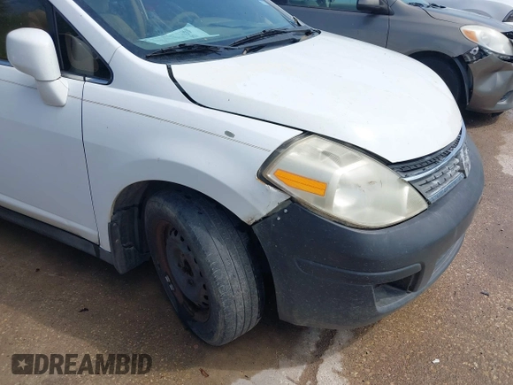 2008 Nissan Versa 1.8 S with VIN 3N1BC11E38L392277, listed as a IAAI auction lot 41927976 with 135,795 mi miles. Bid and sale history available at carsss.com. Image 6.