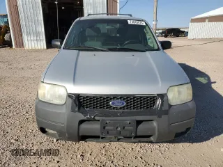 2003 Ford Escape XLT Popular 2 with VIN 1FMYU93123KD17718, listed as a Copart auction lot 74043074 with 347,585 mi miles and Clean Title. Bid and sale history available at carsss.com. Image 5.