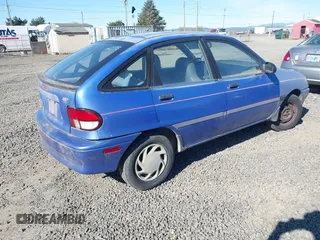 1995 Ford Aspire z VIN KNJLT06H7S6105536, wystawiony jako IAAI lot #41860978 z przebiegiem 66 132 mil mil oraz . Historia ofert i sprzedaży dostępna na DreamBid. Obrazek 4.